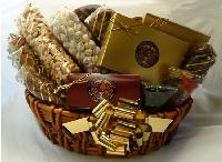 Ultimate Signature Basket - This traditional honey colored wall basket is overflowing with gourmet confections.